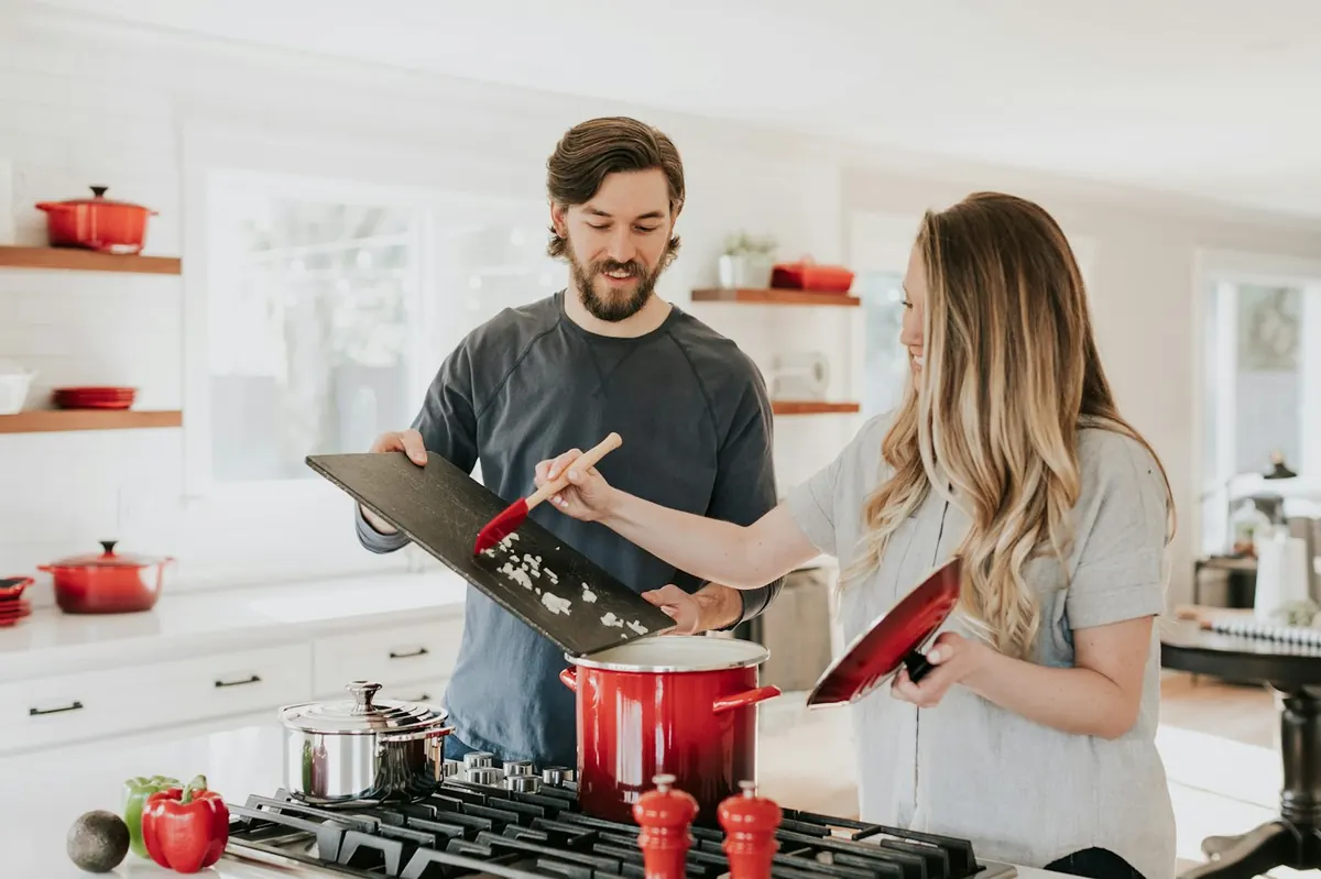Certified gas appliance installer in Decatur Georgia connecting a gas line with a new flexible connector and shutoff valve