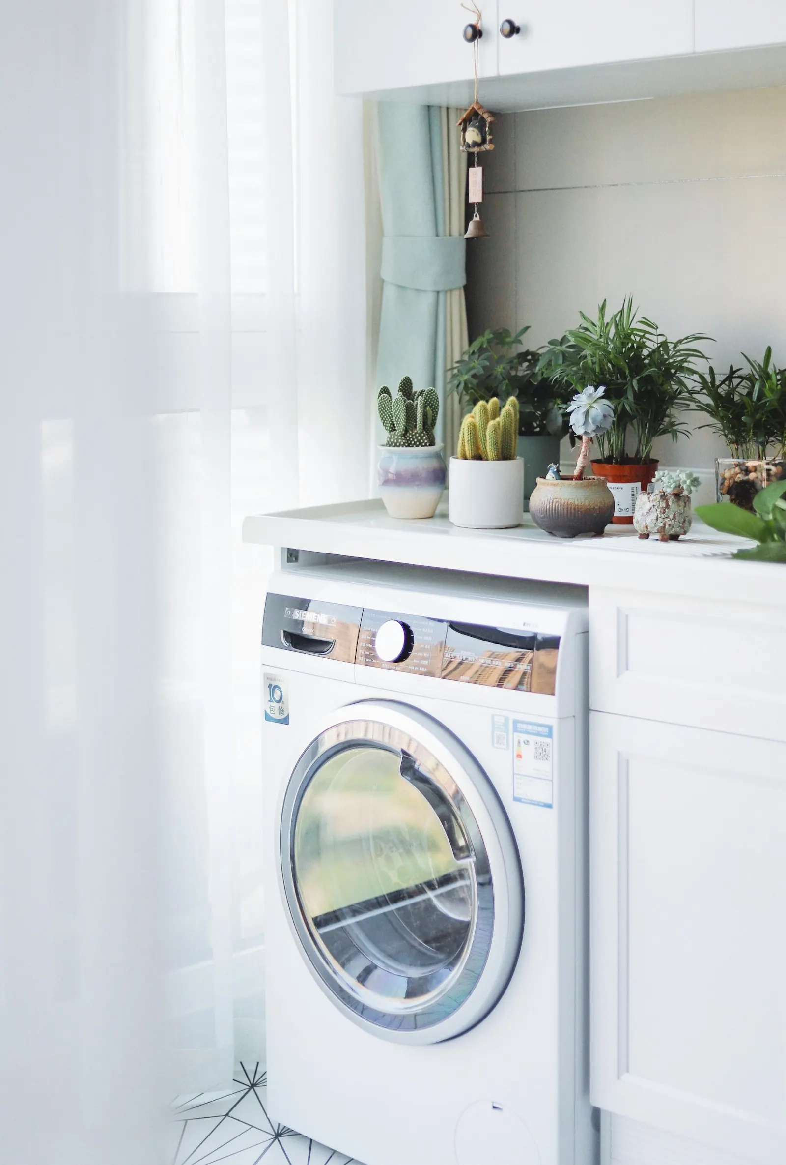 Same-day dryer repair technician in Decatur GA servicing a clothes dryer