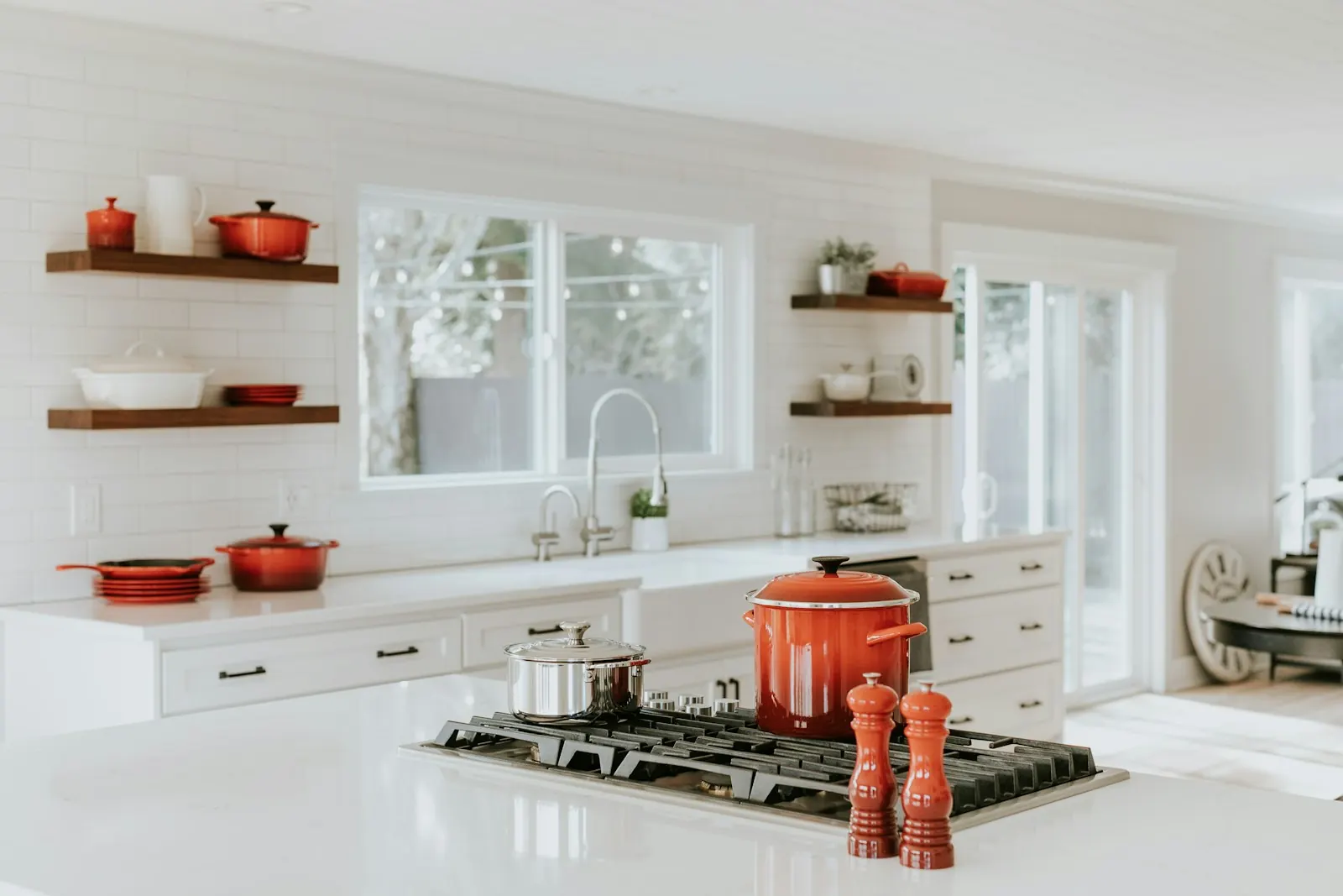 Gas appliance installation in Decatur GA - Decatur Solution Works technician connecting and leak-testing a new gas range